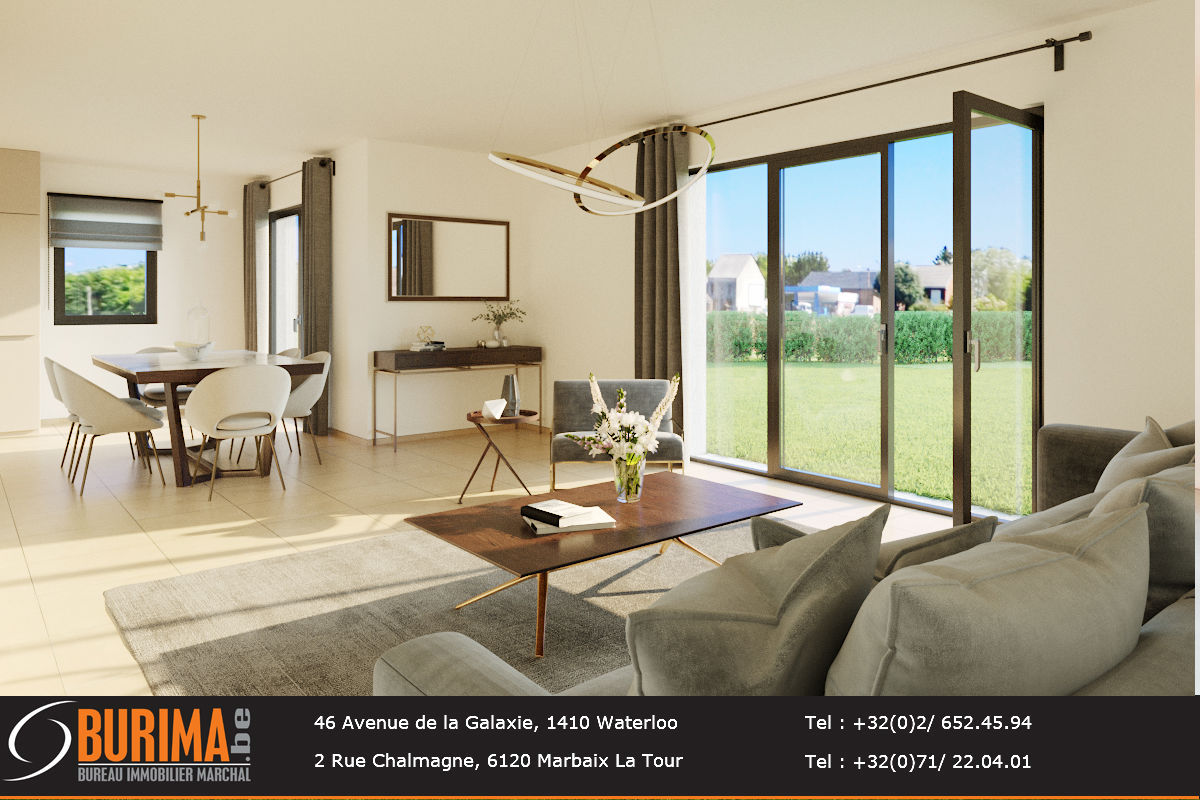 Salon lumineux avec canapé et table basse, donnant sur jardin via de grandes baies vitrées; espace moderne et élégant. Estimation appartement possible grâce à Burima.